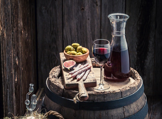 red-wine-with-snacks-and-demijohn-in-basement-2022-03-31-18-27-18-utc.jpg